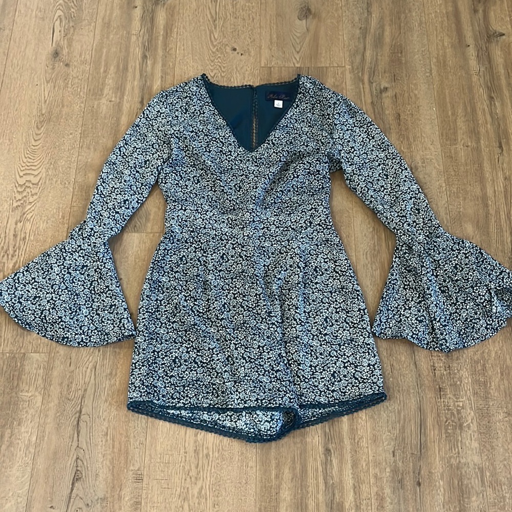 Teal Blue Rain Romper from Francesca’s